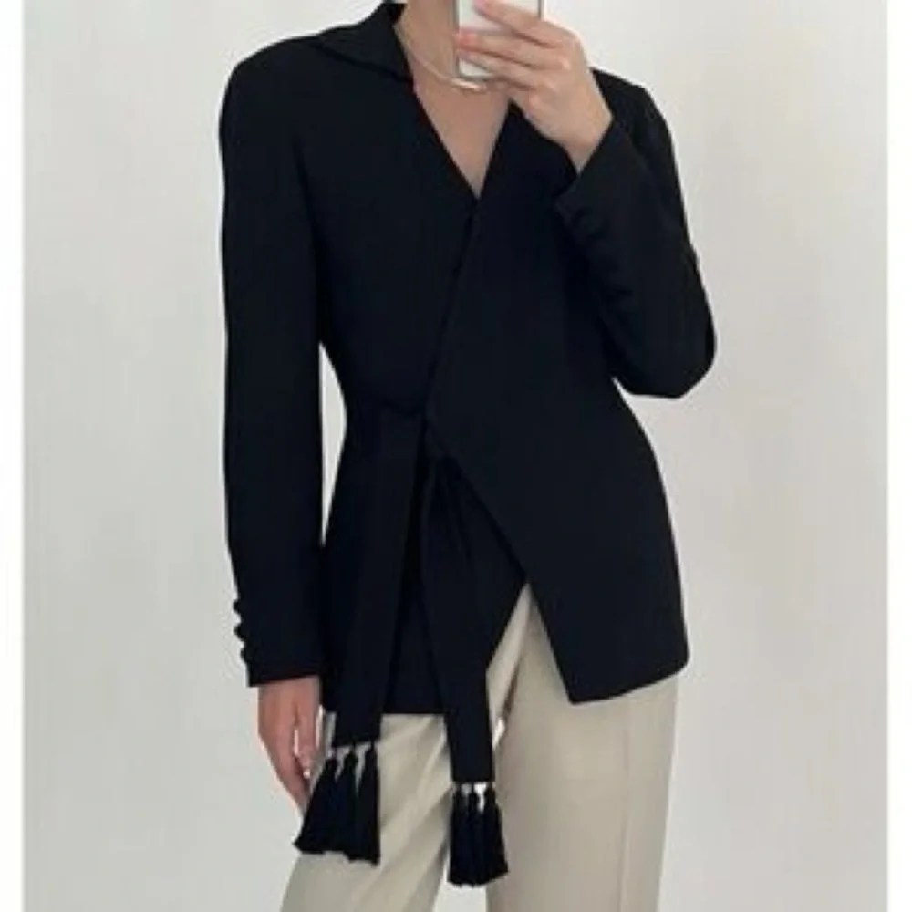 Early 1990s Christian Dior blazer with sleek wrap